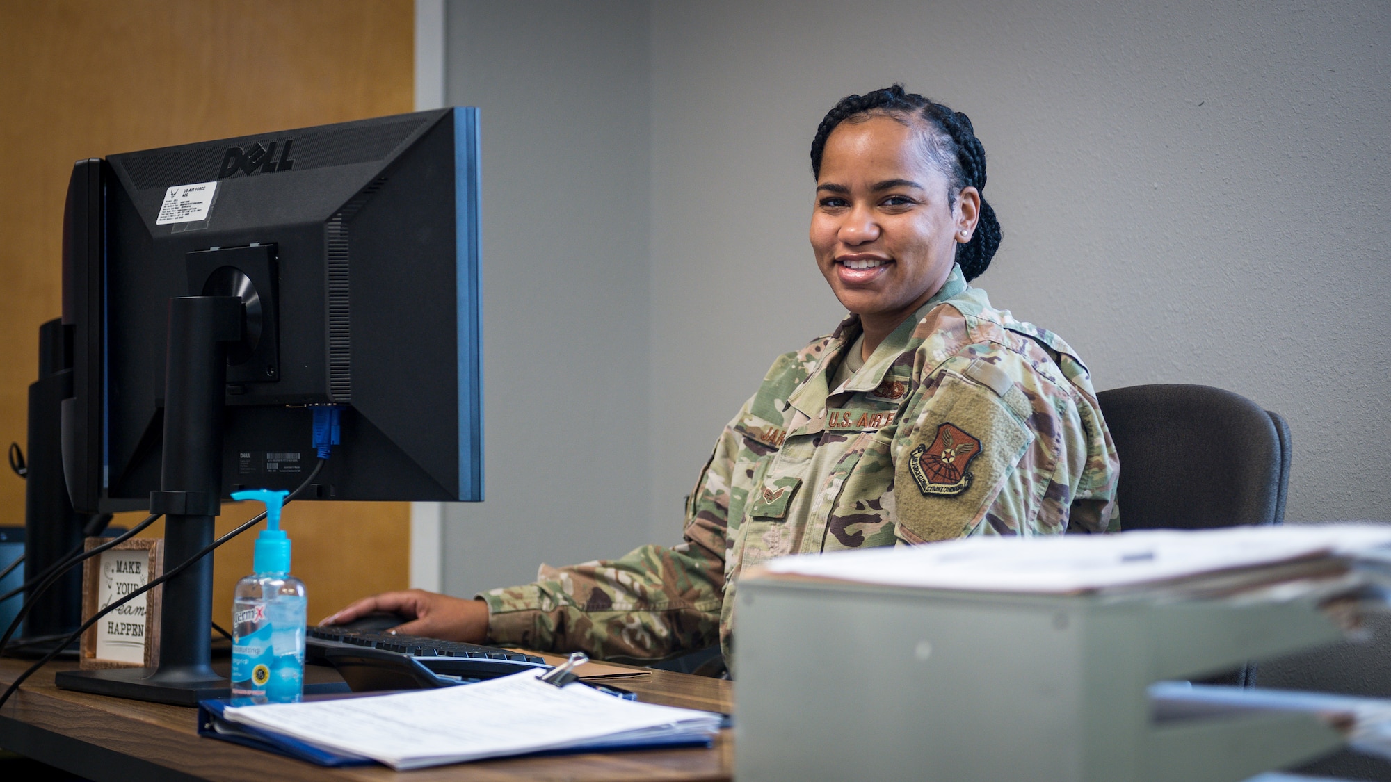 Senior Airman Destiny Jarvis, 2nd Logistics Readiness Squadron traffic management office personal property counselor, poses for a photo in the new River’s Edge Welcome Center at Barksdale Air Force Base, La., June 29, 2020.