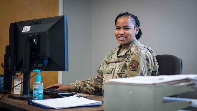 Senior Airman Destiny Jarvis, 2nd Logistics Readiness Squadron traffic management office personal property counselor, poses for a photo in the new River’s Edge Welcome Center at Barksdale Air Force Base, La., June 29, 2020.