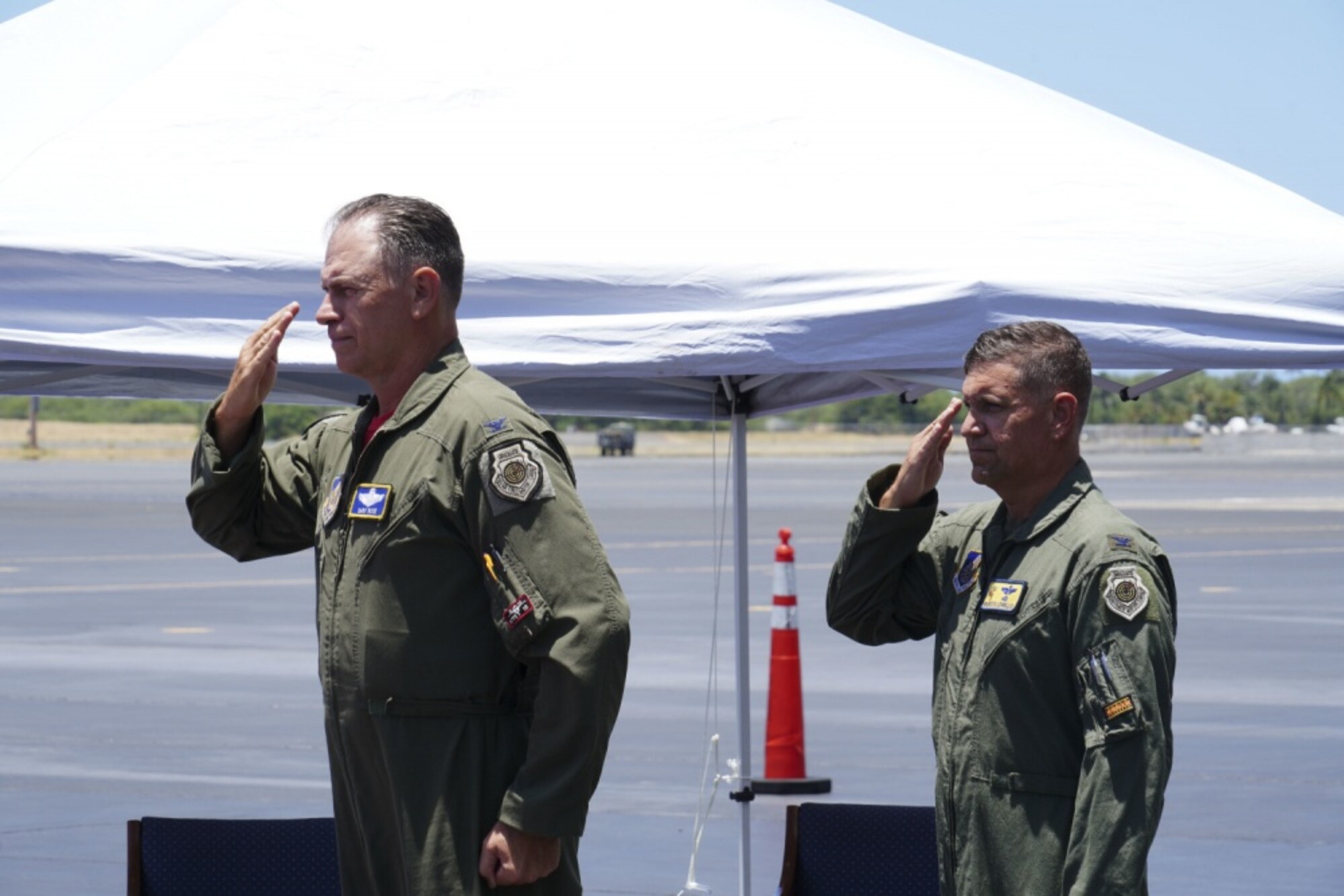 Col. Geoffrey E. Lohmiller, 15th Wing vice commander, renders his final salute during his retirement ceremony at Joint Base Pearl Harbor-Hickam, Hawaii, June 26, 2020. Lohmiller, who served as the vice wing commander since May 2018, will retire later this year. (U.S. Air Force photo by Airman 1st Class Erin Baxter)