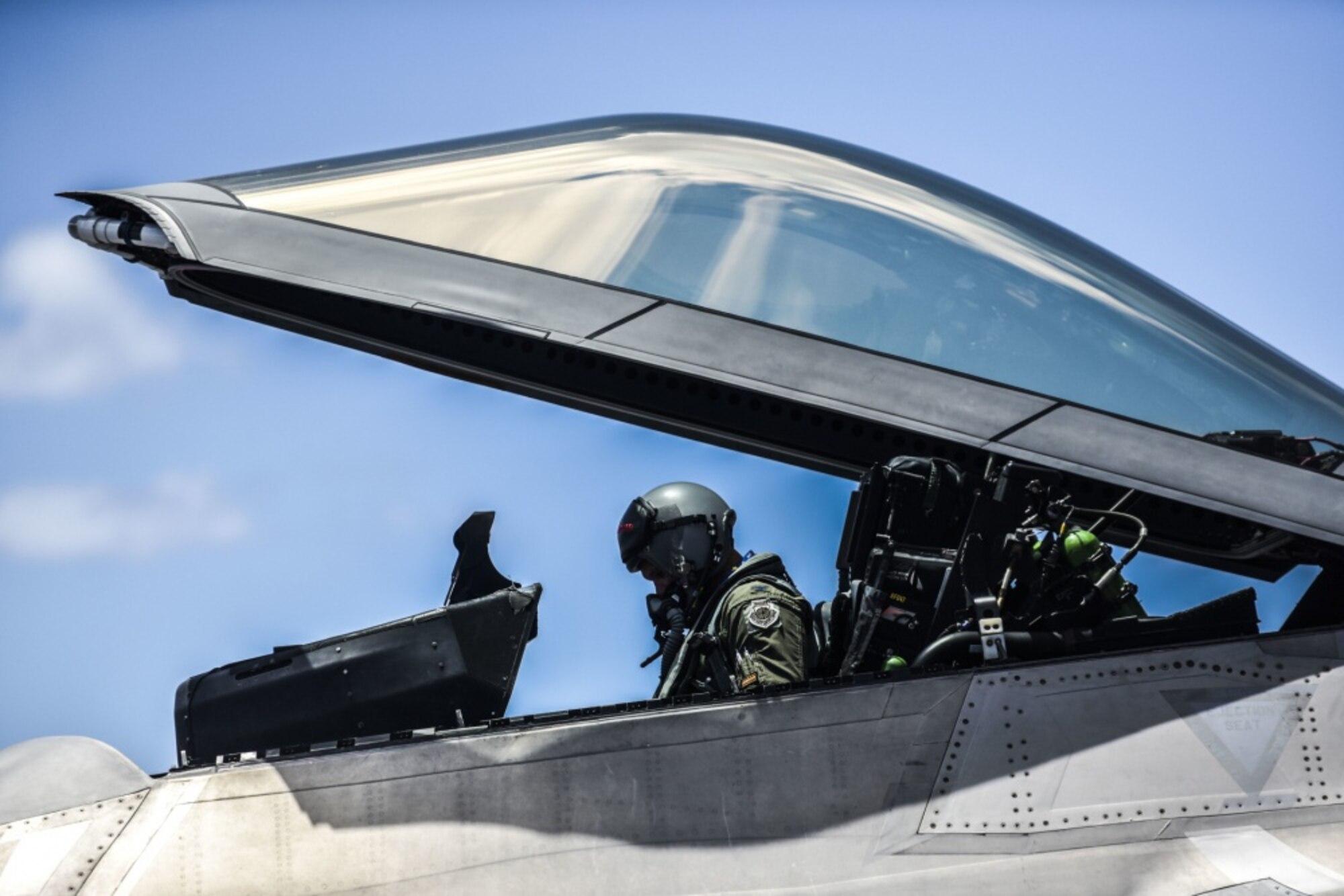 Col. Geoffrey E. Lohmiller, 15th Wing vice commander, exits an F-22 Hawaiian Raptors for the last time during his fini flight at Joint Base Pearl Harbor-Hickam, Hawaii, June 26, 2020. Lohmiller, who served as the vice wing commander since May 2018, will retire later this year. (U.S. Air Force photo by Tech. Sgt. Anthony Nelson Jr.)