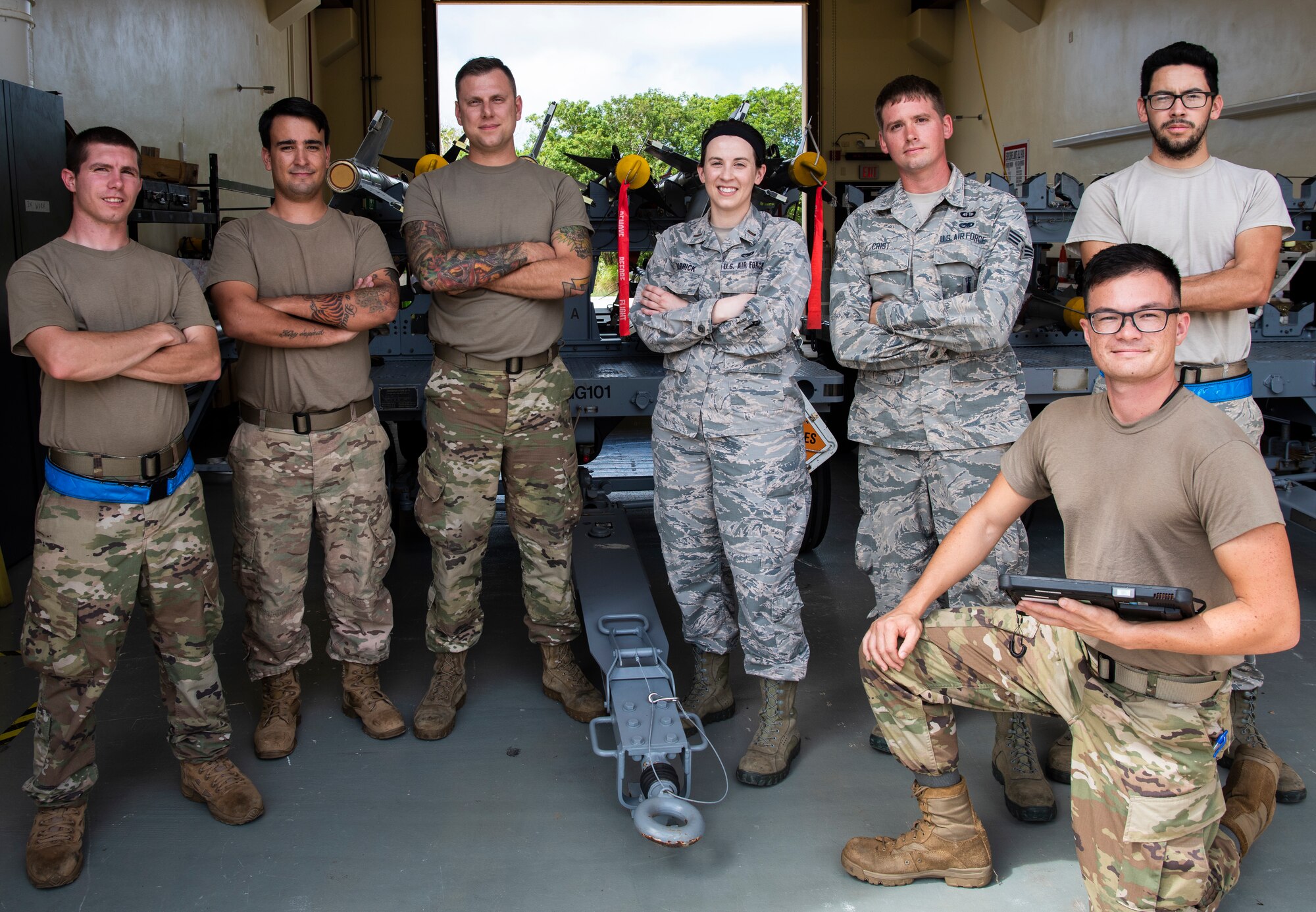 U.S. Air Force 2nd Lt. Megan Barrick, 36th Munitions Squadron (MUNS), Flight Commander, stands with her Airmen, Feb. 27 2020, at Andersen Air Force Base, Guam.
