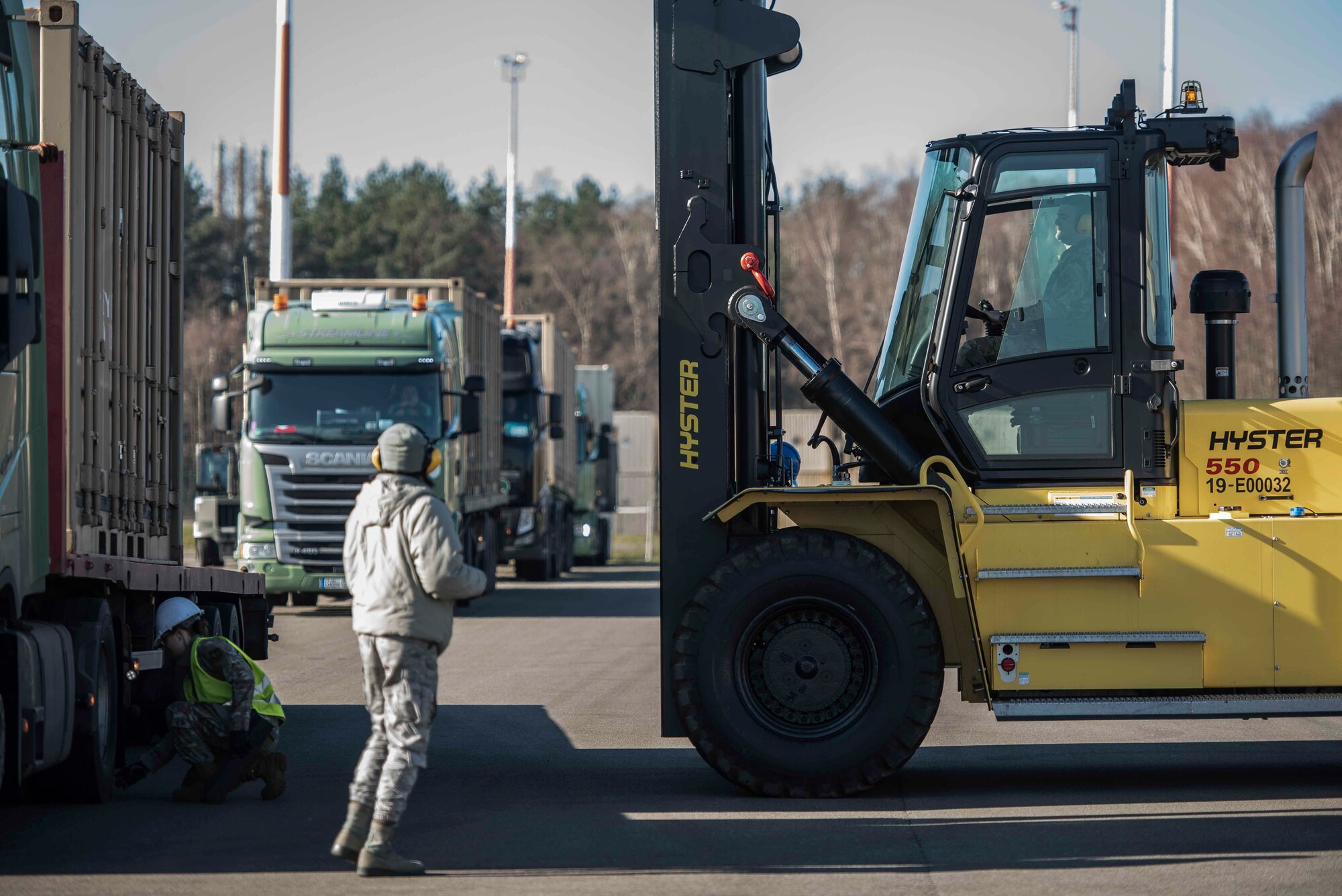 U.S. Airmen assigned to the 86th Munitions Squadron unload containers of inert munitions inside the 86th MUNS compound at Ramstein Air Base, Germany, Feb. 6, 2020. The 86th MUNS received truckloads of munitions daily in the span of one week. (U.S. Air Force photo by Staff Sgt. Devin Nothstine)