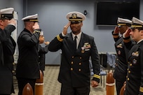U.S. Navy Lt. Robert Daniels is piped ashore during his retirement ceremony at Joint Task Force Civil Support (JTF-CS) headquarters. The ceremony,