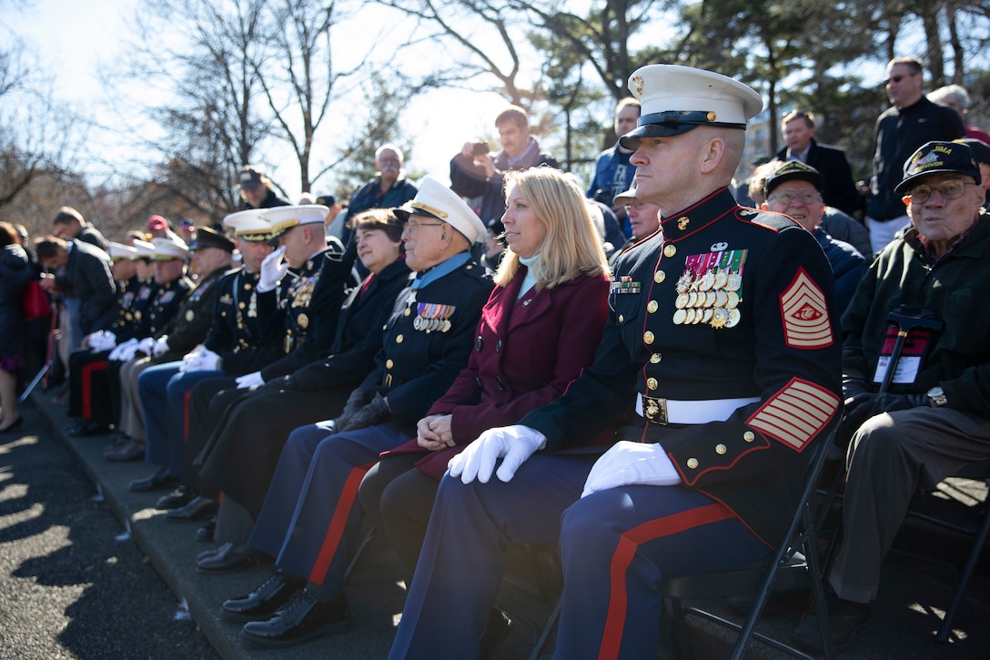 The 19th Sergeant Major of the Marine Corps, Sgt. Maj. Troy E. Black attends a wreath laying ceremony in honor of the 75th anniversary of the battle of Iwo Jima at the Marine Corps War Memorial in Arlington, V.A., Feb. 27, 2020. The Marine Corps hosted the ceremony to honor the veterans of World War II with speeches by the Commandant of the Marine Corps and the Sergeant Major of the Marine Corps. The warrior spirit demonstrated by Marines and sailors of yesterday fuel the tradition of warfighters engaging in today’s battlespace. (U.S. Marine Corps photo by Sgt. Victoria Ross)