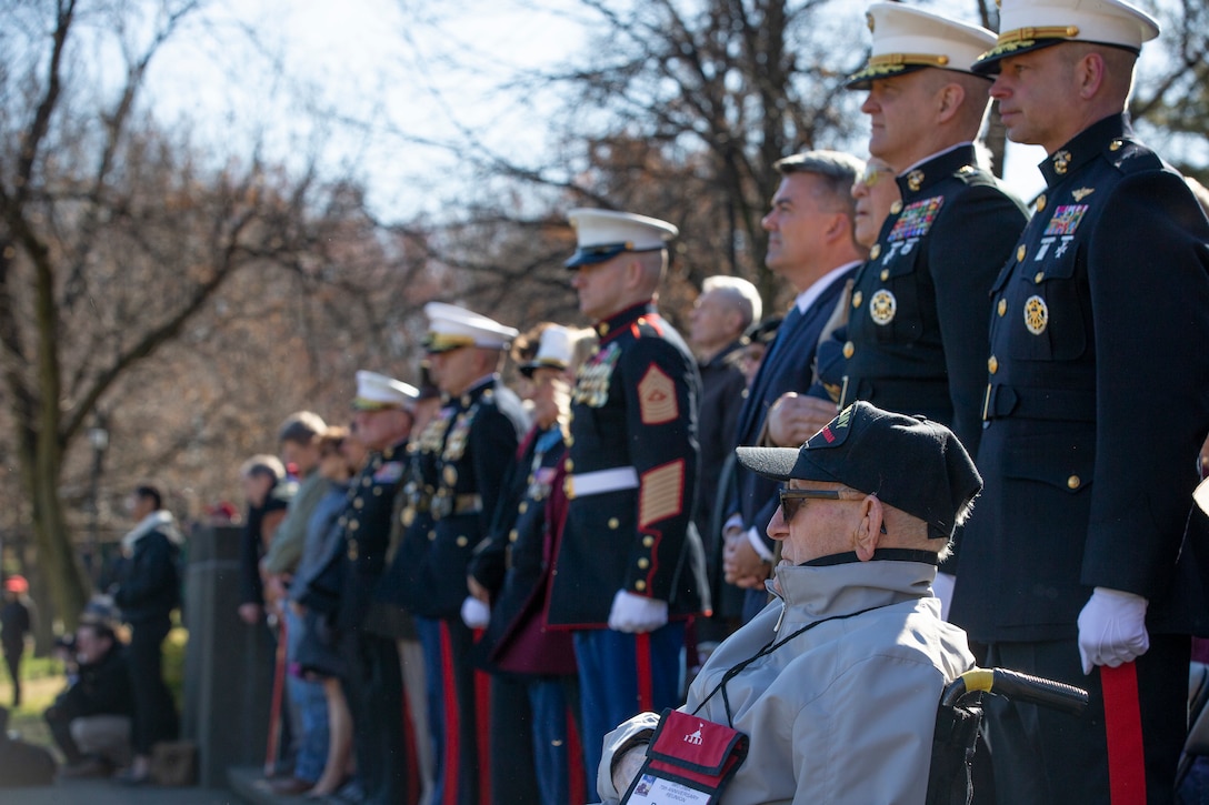 U.S. Marines and World War II veterans attend a wreath laying ceremony in honor of the 75th anniversary of the battle of Iwo Jima at the Marine Corps War Memorial in Arlington, V.A., Feb. 27, 2020. The Marine Corps hosted the ceremony to honor the veterans of World War II with speeches by the Commandant of the Marine Corps and the Sergeant Major of the Marine Corps. The warrior spirit demonstrated by Marines and sailors of yesterday fuel the tradition of warfighters engaging in today’s battlespace. (U.S. Marine Corps photo by Sgt. Victoria Ross)