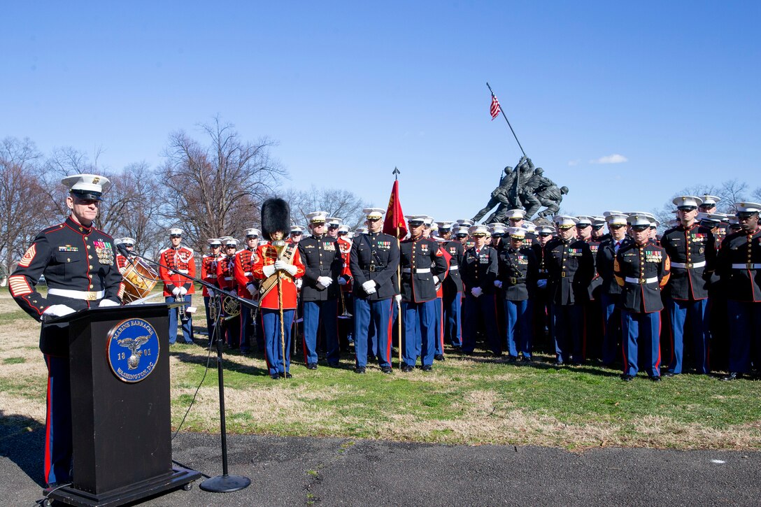 The 19th Sergeant Major of the Marine Corps, Sgt. Maj. Troy E. Black speaks at a wreath laying ceremony in honor of the 75th anniversary of the battle of Iwo Jima at the Marine Corps War Memorial in Arlington, V.A., Feb. 27, 2020. The Marine Corps hosted the ceremony to honor the veterans of World War II with speeches by the Commandant of the Marine Corps and the Sergeant Major of the Marine Corps. The warrior spirit demonstrated by Marines and sailors of yesterday fuel the tradition of warfighters engaging in today’s battlespace. (U.S. Marine Corps photo by Sgt. Victoria Ross)