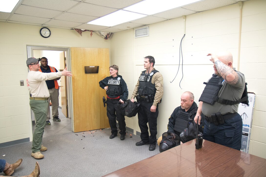 U.S. Army Engineer Research and Development Center security guards review operations during active shooter drills at the Department of the Army Security Guards Mobile Training Team Train-the-Trainer Course.