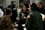 U.S. Air Force medical personnel assigned to multiple Air National Guard units prepare equipment onboard a C-17 Globemaster departing for a joint medical evacuation exercise with Tampa, Florida, partners during Patriot South 2020 at the Gulfport Combat Readiness Training Center in Gulfport, Miss., Feb. 27, 2020.  PATRIOT is a domestic operations disaster-response training exercise conducted by National Guard units working with federal, state and local emergency management agencies and first responders.