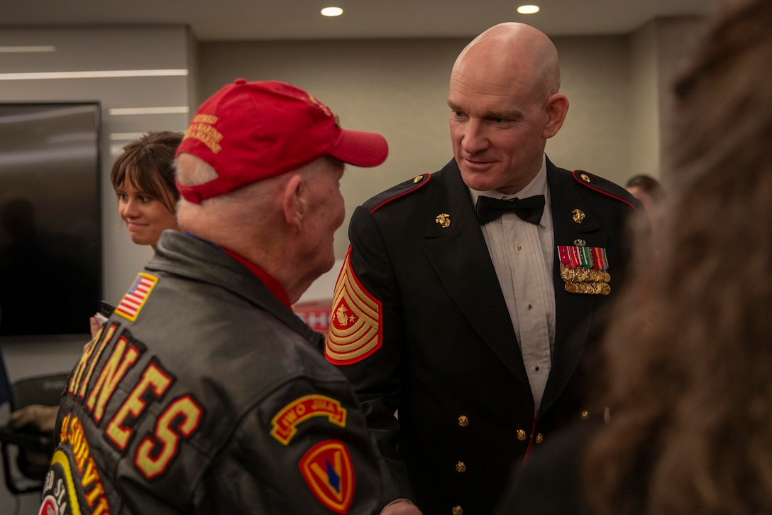 The 19th Sergeant Major of the Marine Corps, Sgt. Maj. Troy E. Black, greats veterans at the Iwo Jima 75th Anniversary Gala in Arlington, V.A., Feb. 29, 2020. The event was hosted by the Iwo Jima Association of America to bring veterans together through shared experiences to honor their service and to remember those that gave the ultimate sacrifice. (U.S. Marine Corps photo by Sgt. Victoria Ross)