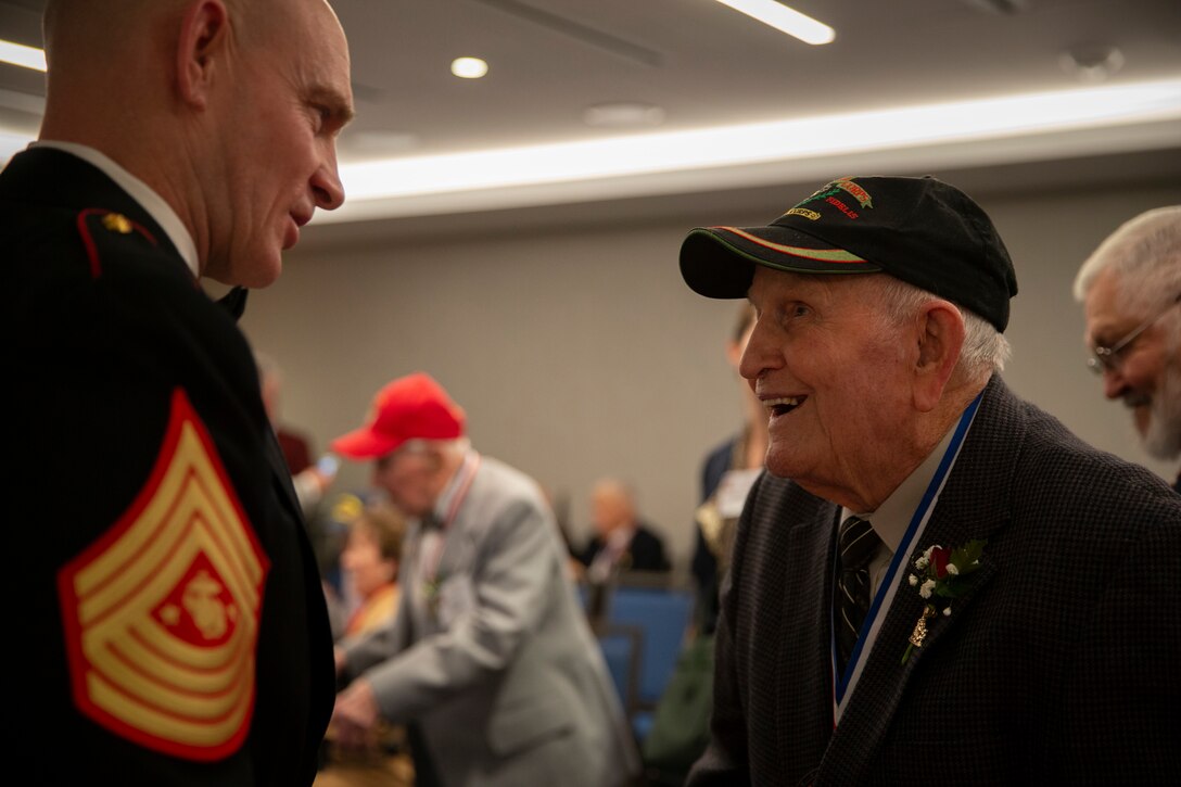 The 19th Sergeant Major of the Marine Corps, Sgt. Maj. Troy E. Black, greats veterans at the Iwo Jima 75th Anniversary Gala in Arlington, V.A., Feb. 29, 2020. The event was hosted by the Iwo Jima Association of America to bring veterans together through shared experiences to honor their service and to remember those that gave the ultimate sacrifice. (U.S. Marine Corps photo by Sgt. Victoria Ross)