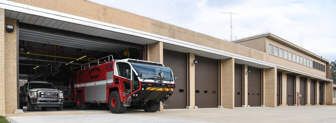 An aircraft firefighting vehicle and truck sit, Jan. 31, 2020, in a bay expanded to accommodate two aircraft firefighting vehicles as part of a construction project at the Arnold Air Force Base Fire and Emergency Services building. The overhead doors for the building were also replaced as part of the project. (U.S. Air Force photo by Jill Pickett)