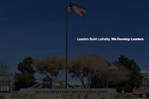 Hero image of the NCOL CoE Flagpole with the quote Leaders Build Lethality.  We Develop Leaders.