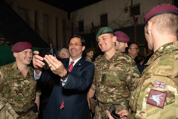 Defense Secretary Dr. Mark T. Esper takes a photo while meeting with coalition service members in Kabul, Afghanistan, Feb. 29, 2020.
