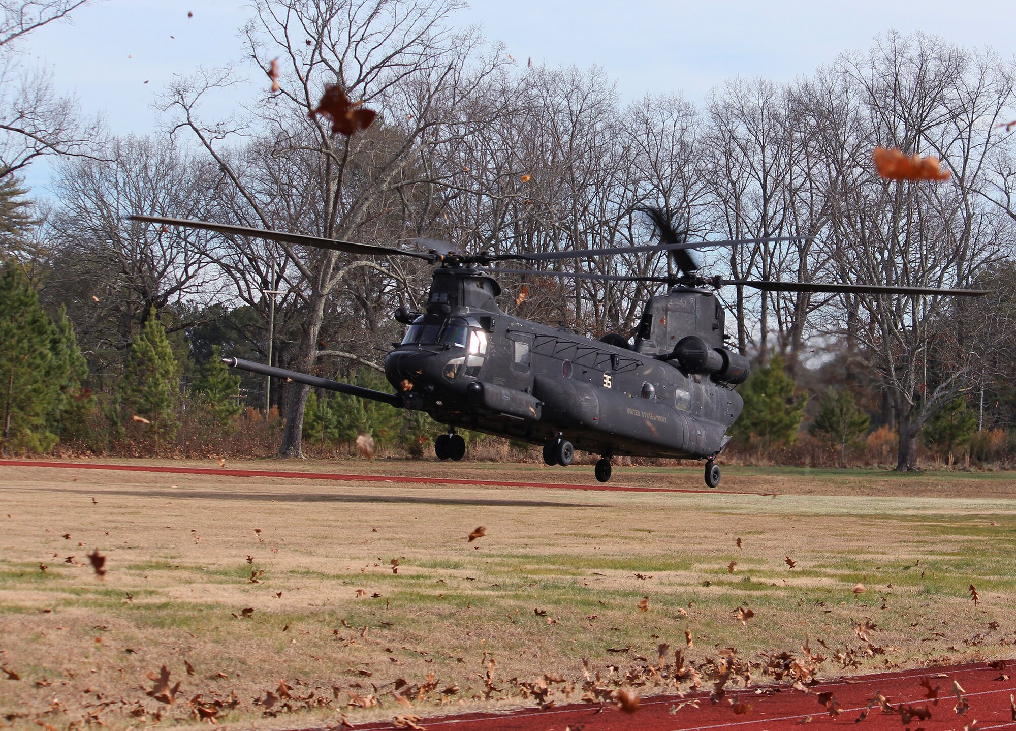 A Boeing CH-47 Chinook lands at Arnold Air Force Base, Tenn., as part of a training exercise Dec. 20, 2019, for members of Arnold Fire and Emergency Services. During the training, the FES personnel learned about the equipment and various working parts of three different U.S. Army helicopters in the event the team is called to an emergency situation involving such aircraft. (U.S. Air Force photo by Deidre Moon)