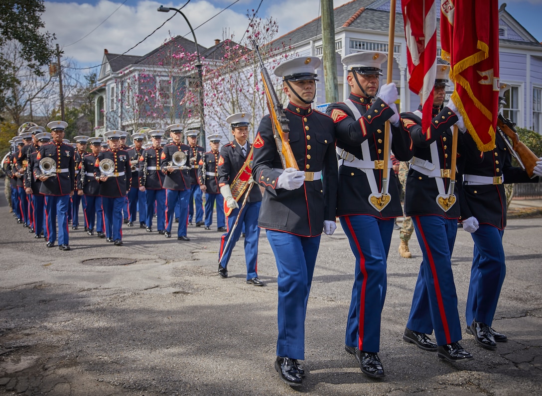 U.S. Marine Corps band members with the Marine Forces Reserve Band march toward the stage during the Algiers Festival 2020 in Federal City, New Orleans, Feb. 1, 2020. The band performed to show their support for the New Orleans community and to kick off the Algiers Festival 2020. (U.S. Marine Corps photo by Lance Cpl. Leslie Alcaraz)