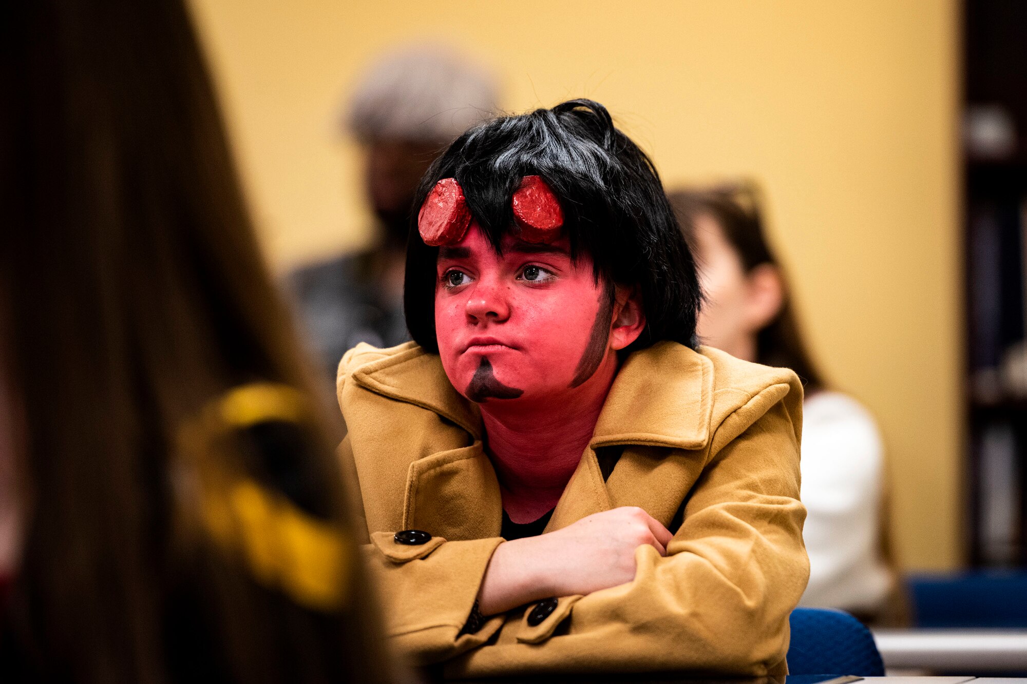 Photo of a guest listening to a panel speaker.