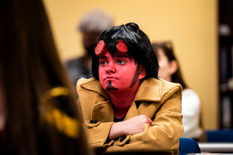 Photo of a guest listening to a panel speaker.