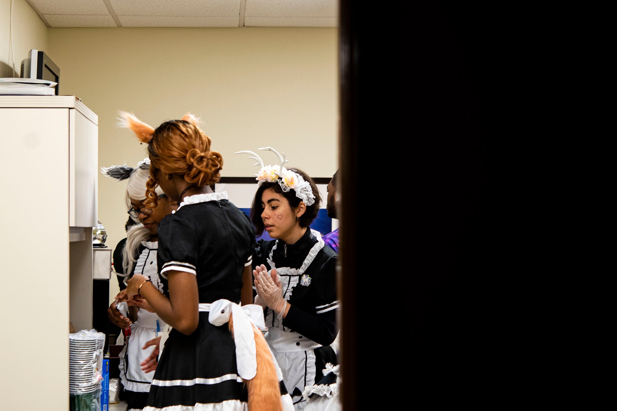 Photo of event staff preparing food.