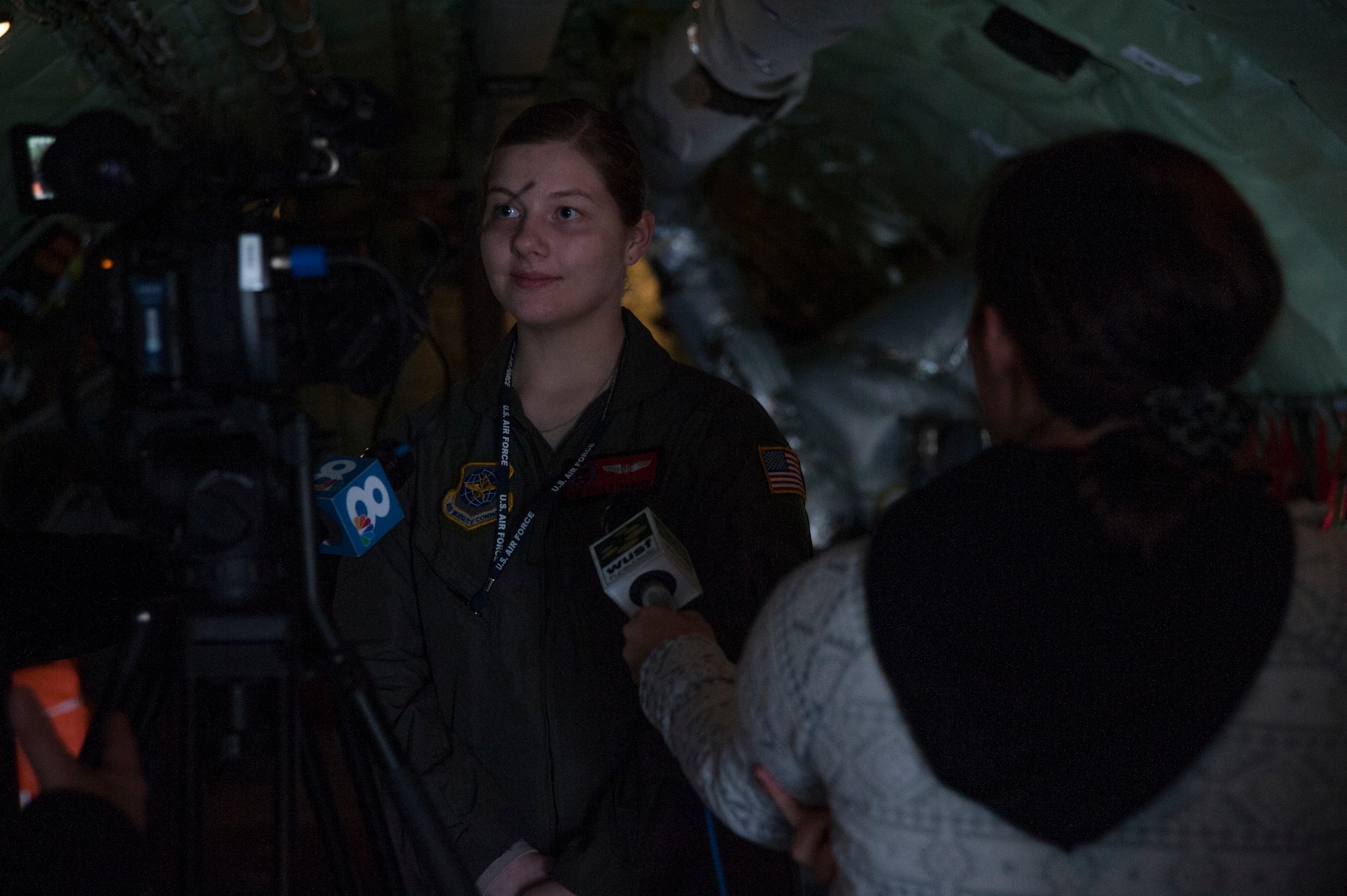U.S. Air Force Airman 1st Class Kylie Strawser a KC-135 Stratotanker boom operator with the 50th Air Refueling Squadron interviews with media from the Tampa Bay area Feb. 27, 2020, at MacDill Air Force Base, Fla.  Strawser explained the capabilities of KC-135 Stratotanker aircraft and the role of boom operators to media representatives during an air refueling training flight, to help inform the community about the mission at the 6th Air Refueling Wing and AirFest 2020.