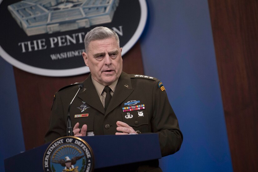 Army Gen. Mark A. Milley speaks at a lectern.