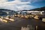 Equipment from the Tromsdal, Frigaard, and Bjugn caves waits to be loaded onto a Britannia Seaways shipping vessel at Orkanger Port, Norway, Feb. 17.