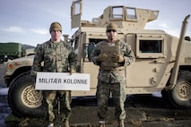 U.S. Marines with Combat Logistics Battalion 451, Combat Logistics Regiment 45, 4th Marine Logistics Group, Marine Forces Reserve, pose for a photo before doing a convoy from Marine Corps Prepositioning Program-Norway caves to Værnes Garrison near Trondheim, Norway, Feb. 14, 2020. MCPP-N gear was later transported from Orkanger Port to Bogen Port in preparation for Exercise Cold Response. Cold Response is a Norwegian-led exercise designed to enhance military capabilities and allied cooperation in high-intensity warfighting in a challenging arctic environment. (U.S. Marine Corps photo by Sgt. Devin J. Andrews)