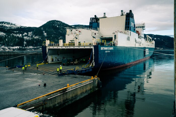 Equipment from the Tromsdal, Frigaard, and Bjugn caves is loaded onto a Britannia Seaways shipping vessel at Orkanger Port, Norway, Feb. 17, 2020. Marine Corps Prepositioning Program-Norway gear was transported from Orkanger Port to Bogen Port in preparation for Exercise Cold Response. Cold Response is a Norwegian-led exercise designed to enhance military capabilities and allied cooperation in high-intensity warfighting in a challenging arctic environment. (U.S. Marine Corps photo by Sgt. Devin J. Andrews)