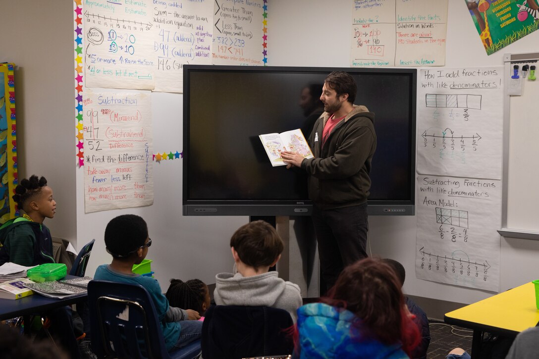 Code 2380 Nuclear Engineer Matthew Antonelli represented Norfolk Naval Shipyard in his first Read Across America Day at James Hurst Elementary School Mar. 2. “I felt this is a wonderful thing the shipyard is doing. We perform work in the community’s backyard and it’s a wonderful experience for us all to participate in. The children loved having us here and we were all sad when it was time for us to go. It’s such a nice feeling to be able to interact with them and get involved. I highly recommend it.”