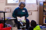 Norfolk Naval Shipyard employee Helen Atkins participated in Read Across America Day at James Hurst Elementary School Mar. 2.