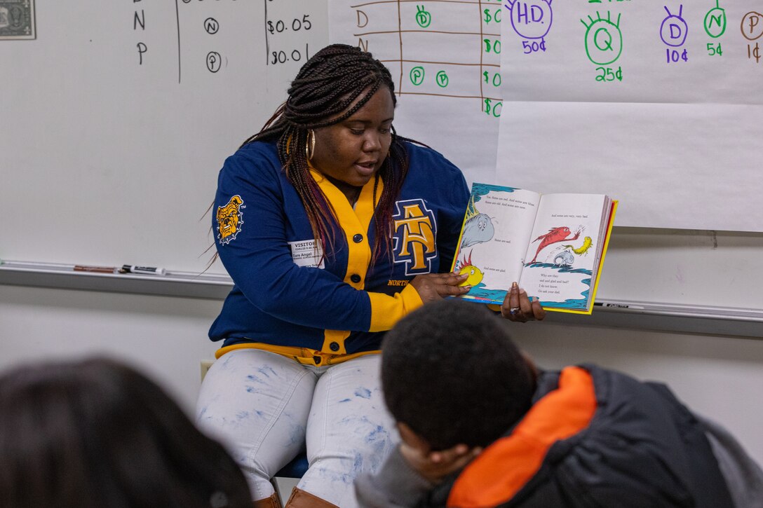 Shop 67 Angel Eure has been participating in the tutoring program at Norfolk Naval Shipyard for four years and is the Tutorial Program Champion for James Hurst Elementary School. She represented America’s Shipyard at James Hurst Mar. 2 as part of Read Across America Day. “Every week I’m here working with the students and each moment has been special to me. The kids are so excited to see us and interact with us and seeing them progress throughout the year is amazing. Getting to do these things like Read Across America is wonderful and it helps instill that love of reading in the younger generation.”