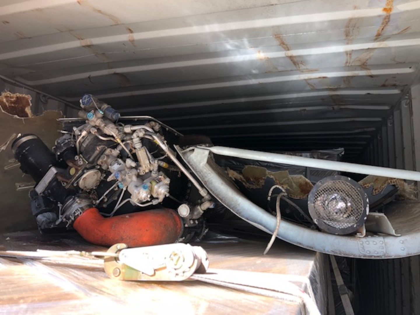 Wreckage from a CV-22 Osprey mishap in 2012 awaits hazardous waste disposal.