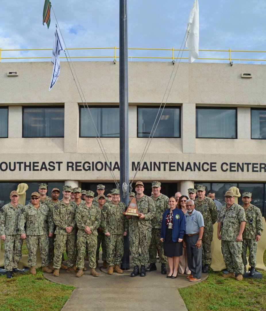 Sailors and Civilians from Southeast Regional Maintenance Center (SERMC) pose with the 2019 Maintenance Award