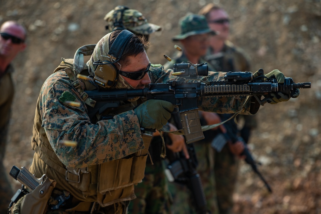 A U.S. Marine fires his M4A1 service rifle during a bilateral shooting package alongside Royal Thai Marines at Camp Lotawin, Kingdom of Thailand, Feb. 25.
