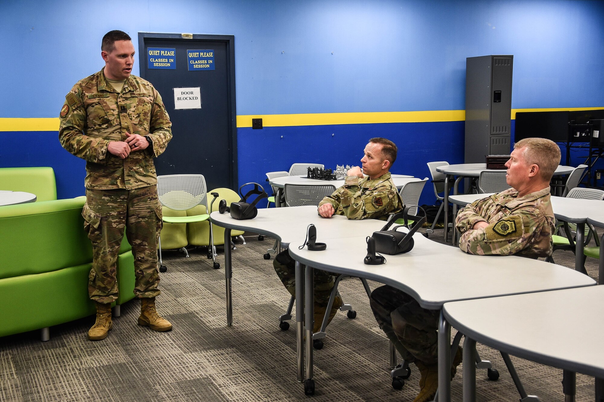 12th Air Force Commander, Maj. Gen. Andrew Croft receives a briefing by Capt. Anthony Cummings, 552nd Training Squadron, on Virtual Reality Training Innovation. The 12th Air Force Commander, Maj. Gen. Andrew Croft, visited the 552nd Air Control Wing at Tinker Air Force Base, Feb. 25, 2020 (U.S. Air Force photo by 2nd Lt. Ashlyn K. Paulson).