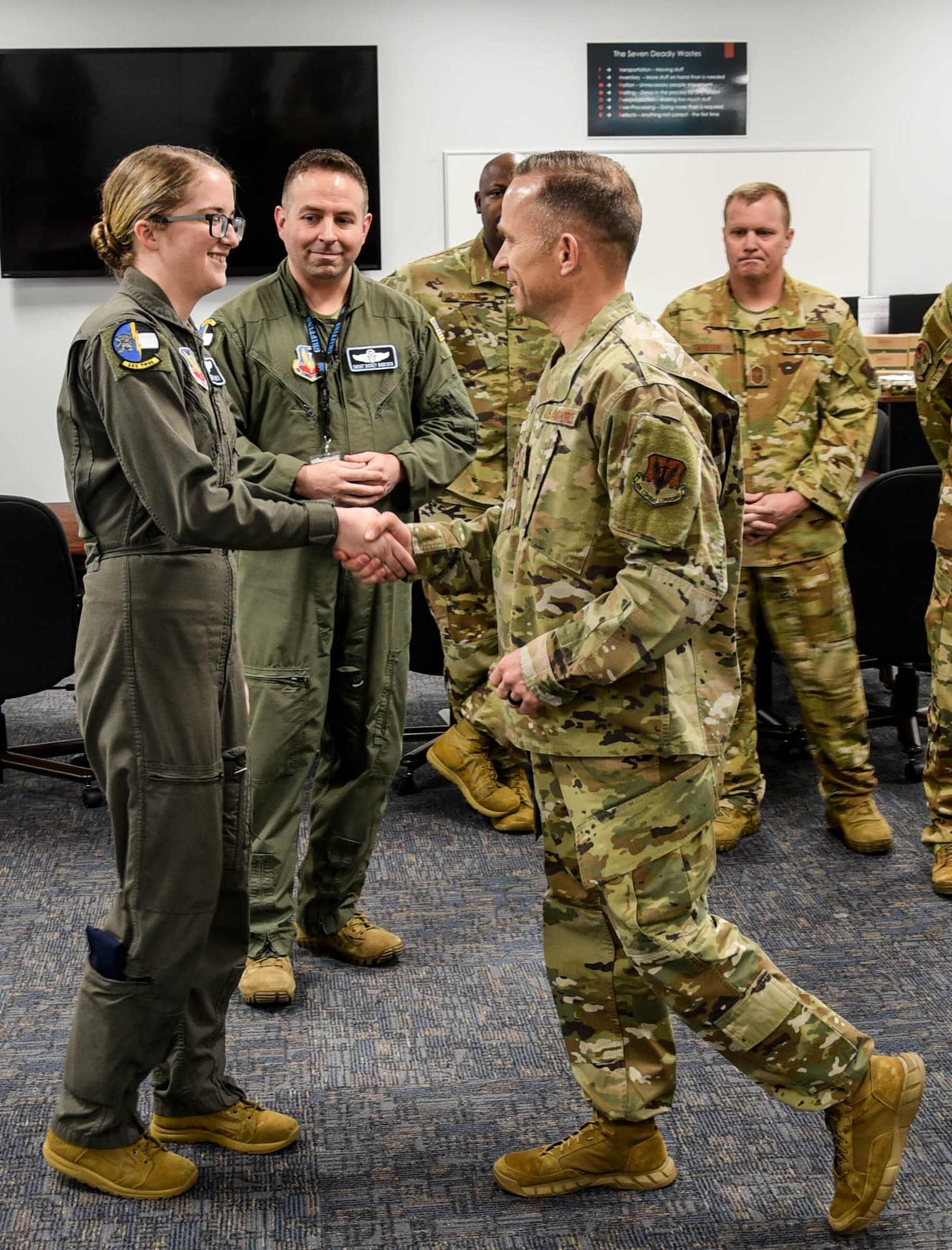 12th Air Force Command Chief, Chief Master Sgt. John Storms, recognizes Airman 1st Class Allison Smith, 552nd Training Squadron. The 12th Air Force Commander, Maj. Gen. Andrew Croft, visited the 552nd Air Control Wing at Tinker Air Force Base, Feb. 25, 2020 (U.S. Air Force photo by 2nd Lt. Ashlyn K. Paulson).