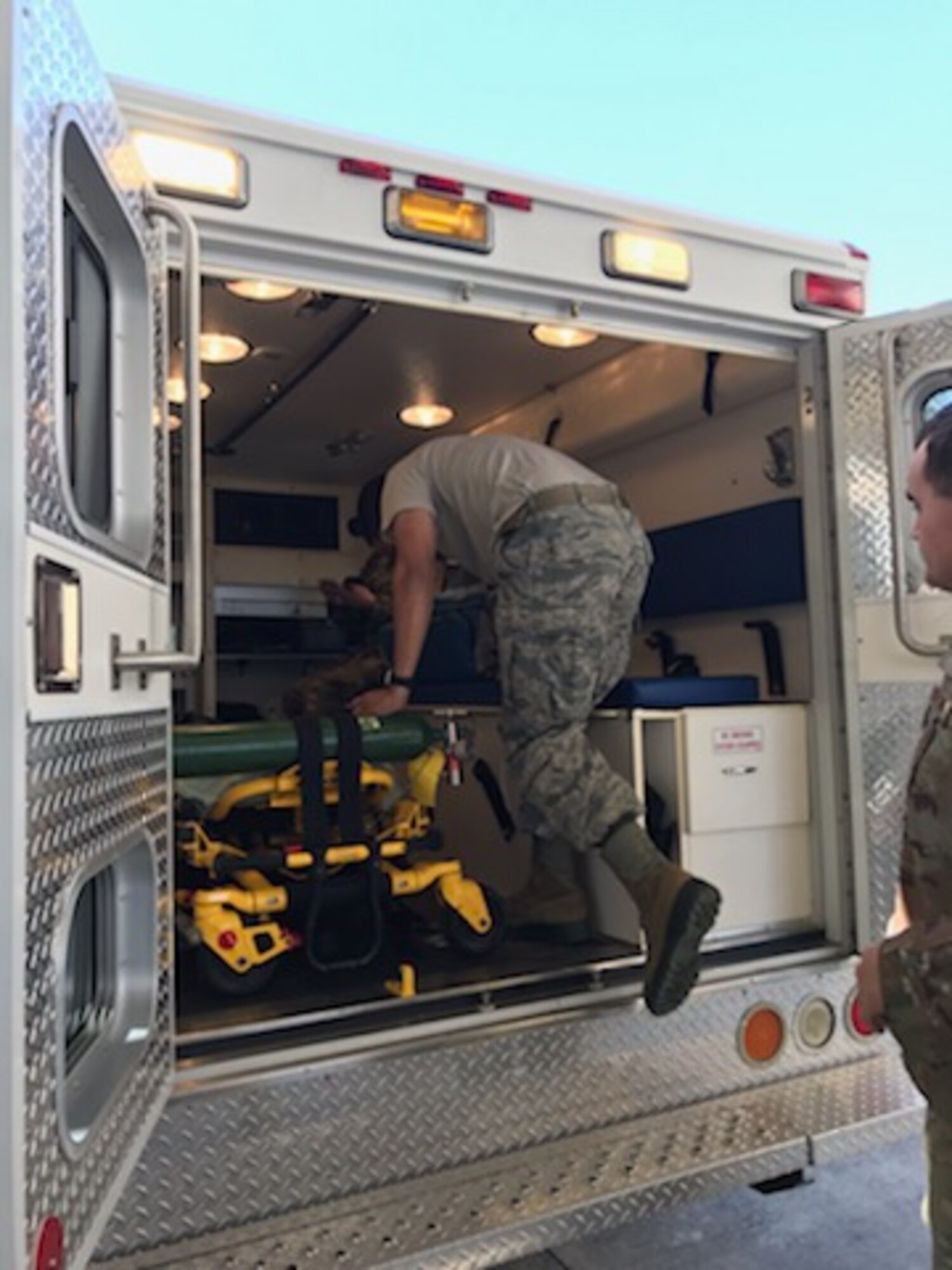 U.S. Air Force Airmen from the 81st Medical Group board an ambulance during an exercise at Keesler Air Force Base, Mississippi, Feb. 27, 2020. The 81st MDG and the Mississippi Army National Guard worked together for an exercise, PATRIOT South, which involved transporting patients, in response to a simulated hurricane, from the Keesler Medical Center to the flightline where they would be airlifted to the Combat Readiness Training Center in Gulfport, Mississippi. "Exercises like this gives Keesler the opportunity to shape planning, assess and validate capabilities and address areas for improvement, making dragon medics more resilient during crisis situations," said Matthew Jalufka, 81st MDG medical emergency manager. (Courtesy photo provided by Matthew Jalufka)