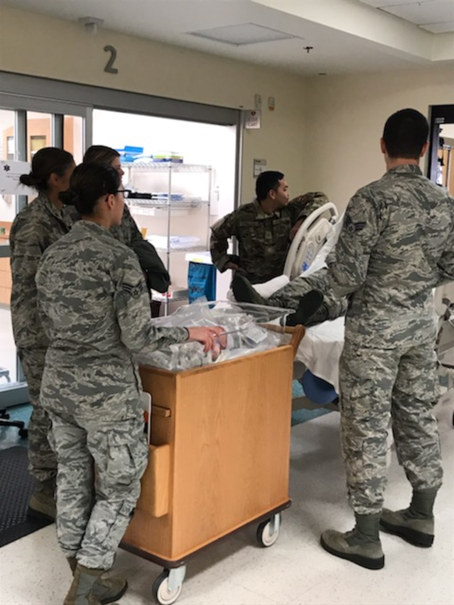U.S. Air Force Airmen from the 81st Medical Group monitor a patient during an exercise at Keesler Air Force Base, Mississippi, Feb. 27, 2020. The 81st MDG and the Mississippi Army National Guard worked together for an exercise, PATRIOT South, which involved transporting patients, in response to a simulated hurricane, from the Keesler Medical Center to the flightline where they would be airlifted to the Combat Readiness Training Center in Gulfport, Mississippi. "Exercises like this gives Keesler the opportunity to shape planning, assess and validate capabilities and address areas for improvement, making dragon medics more resilient during crisis situations," said Matthew Jalufka, 81st MDG medical emergency manager. (Courtesy photo provided by Matthew Jalufka)