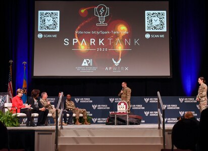 Finalists from Joint Base Langley-Eustis, Virginia, pitch their innovation, Portable Magnetic Aircraft Covers, to a panel of judges during the Spark Tank competition in Orlando, Florida, Feb. 28, 2020.
