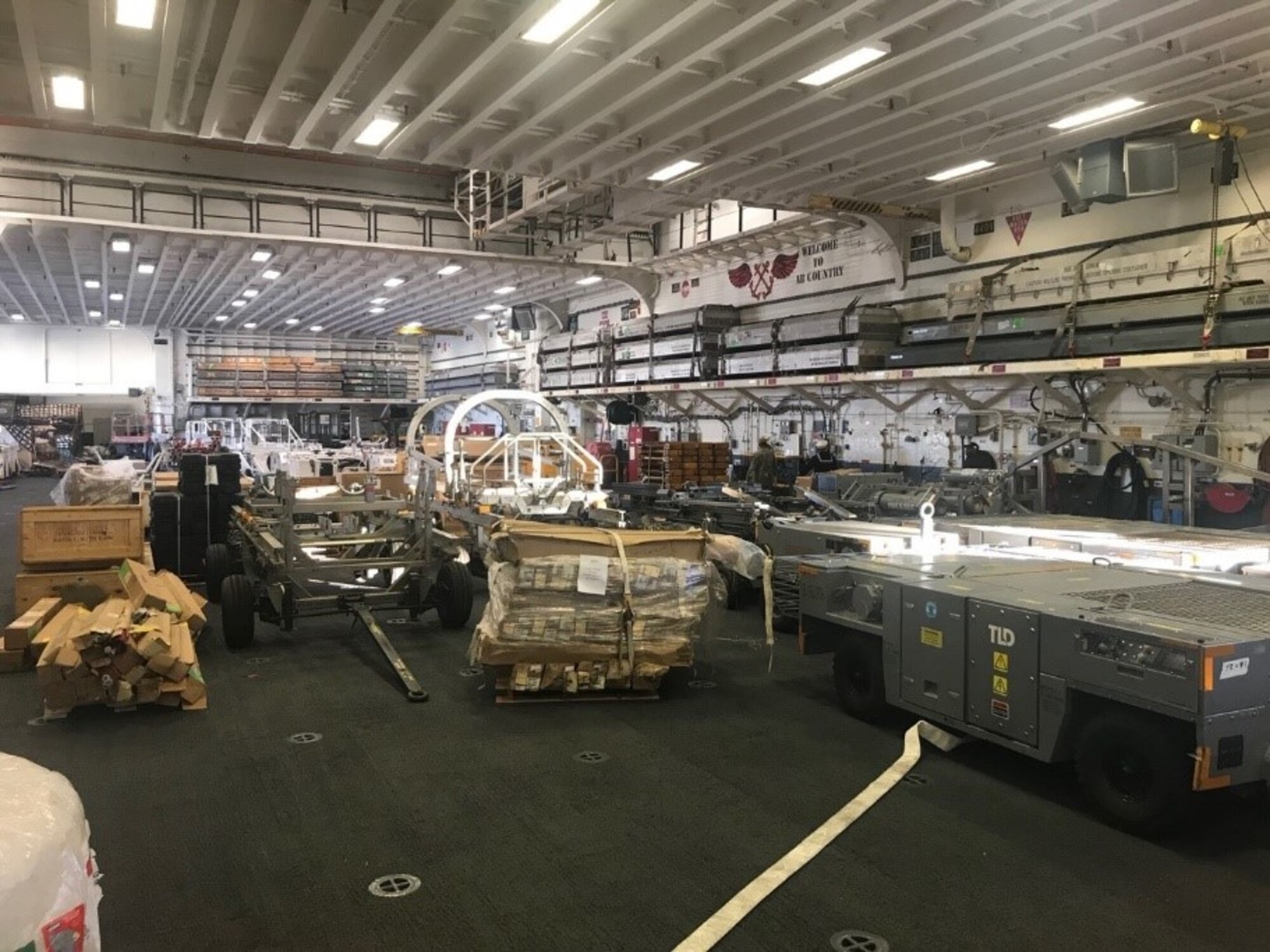 F-35 support equipment awaiting staging into the hull of the USS Makin Island.  (U.S. Air Force photo/Capt. William Fine)