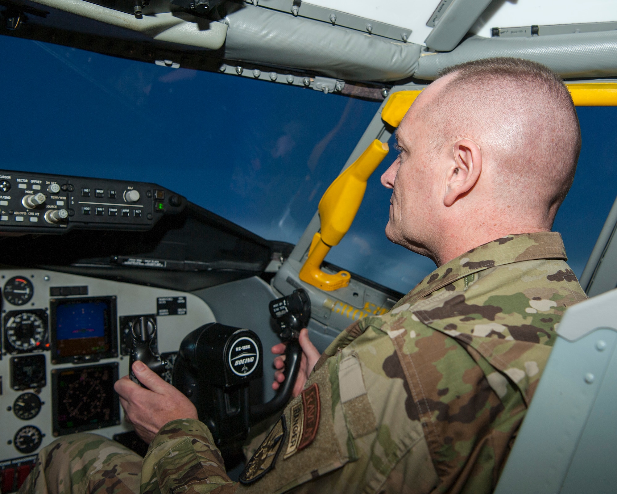 U.S. Air Force Chief Master Sgt. Jason France, the command senior enlisted leader at U.S. Transportation Command, Scott Air Force Base, Ill., co-pilots a KC-135 Stratotanker flight simulator at MacDill Air Force Base, Fla., Feb. 27, 2020.
