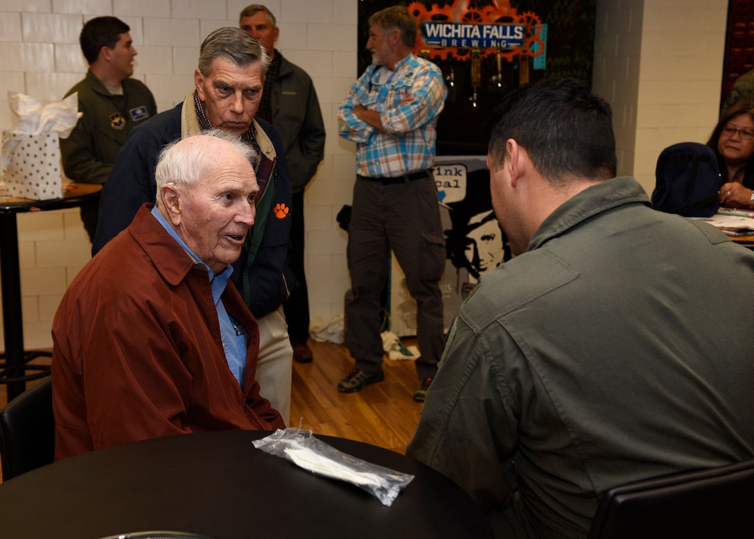 U.S. Army Capt. (Ret) Joe Jones and his son Jim Jones, talk with 80th Flying Training Wing members at Sheppard Air Force Base, Texas, Feb. 28, 2020. Jones is a World War II veteran and served in Gen. George Patton's Third Army. He was first a rifle platoon leader and later a weapons platoon leader (in charge of three 30. cal machine guns and three 60 mm mortars.) Jones has seen combat in France and Germany. (U.S. Air Force photo by Senior Airman Pedro Tenorio)