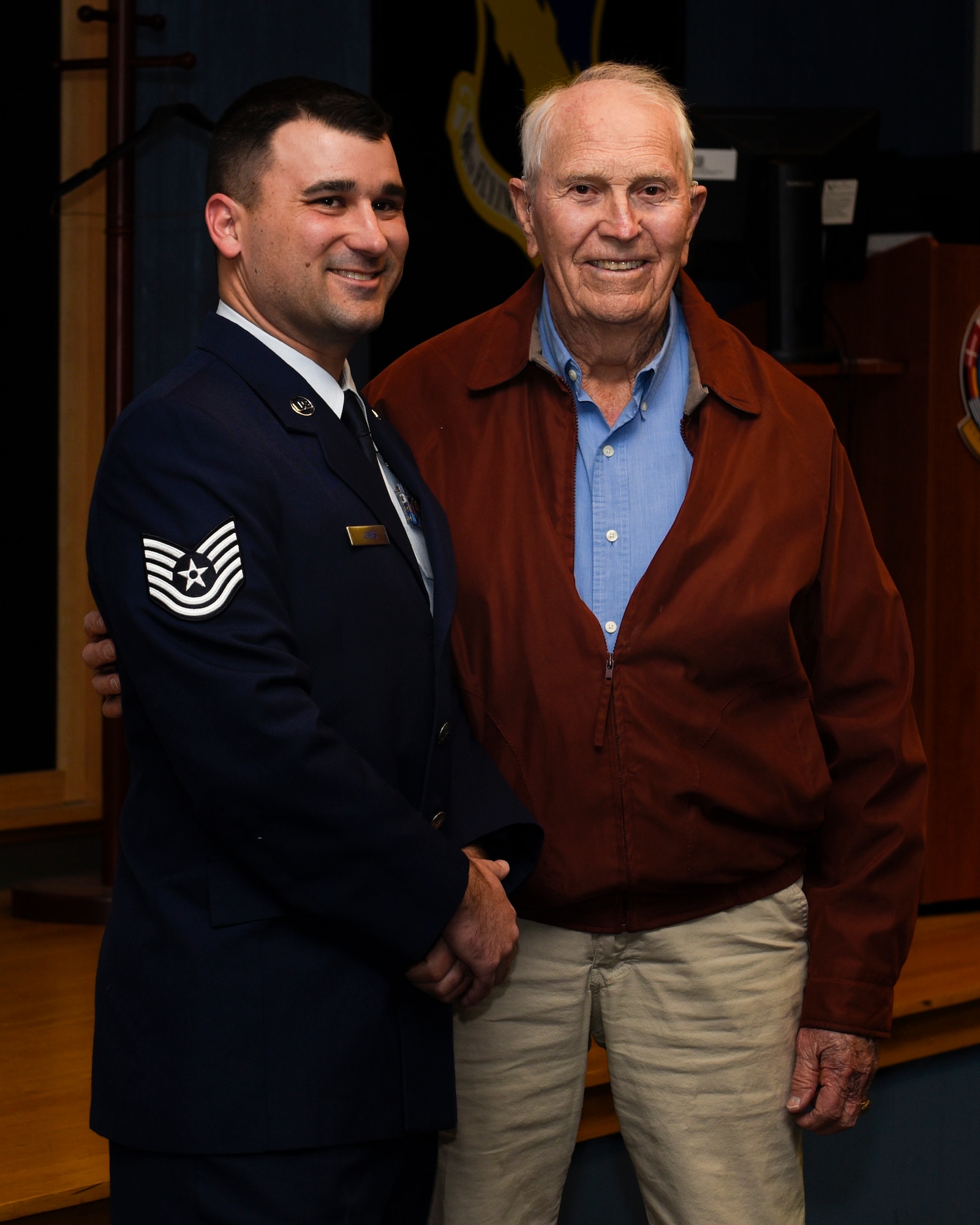 Tech. Sgt. Joe Jones and his grandfather U.S. Army Capt. (Ret) Joe Jones, pose for a photo at Sheppard Air Force Base, Texas, Feb. 28, 2020. Jones invited his grandfather and other family members to see him promote in person for the first time. Jones' grandfather is a World War II veteran and said he was proud to see his grandson in the Air Force. (U.S. Air Force photo by Senior Airman Pedro Tenorio)