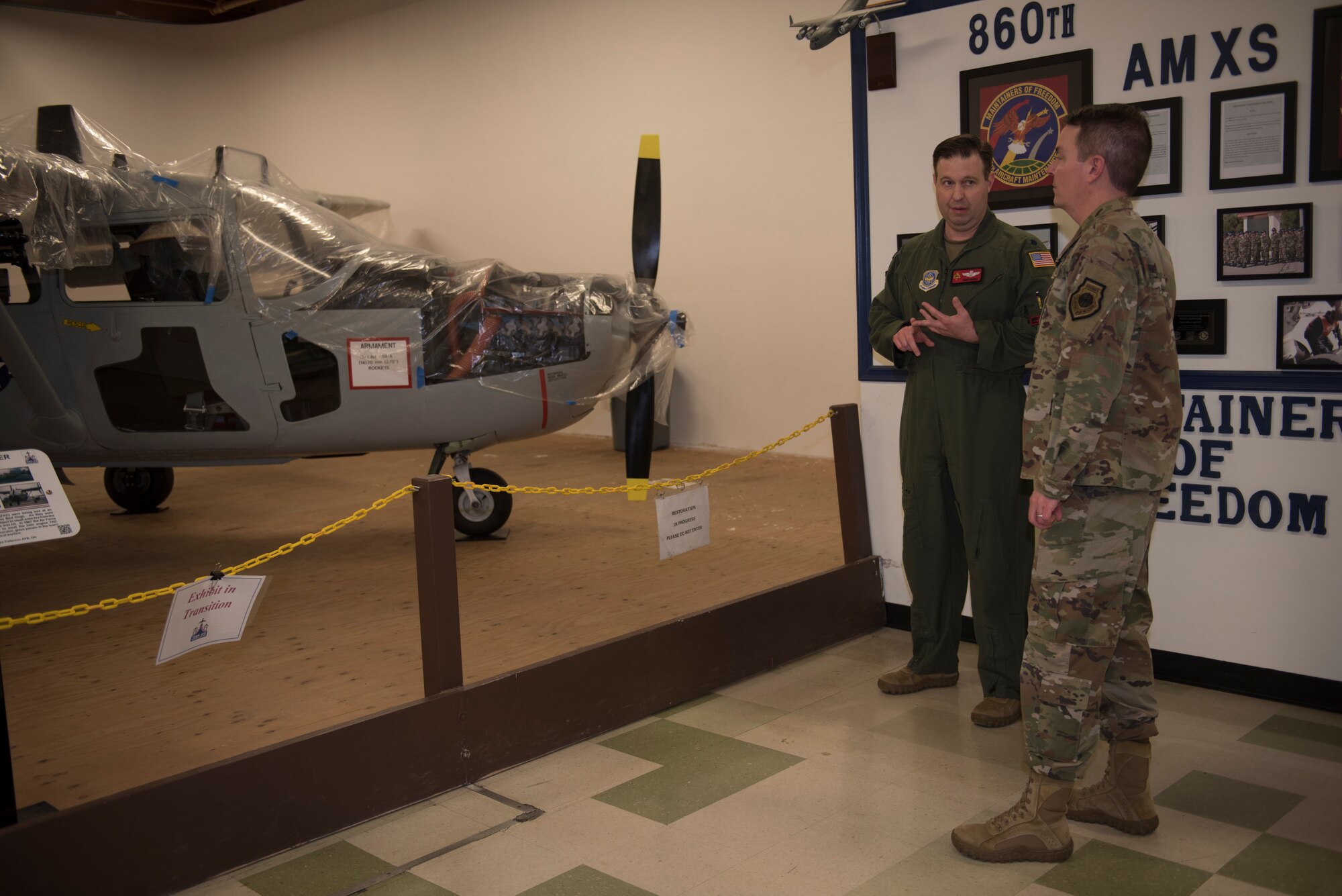U.S. Air Force Lt. Col. Chad Harris, left, 60th Air Mobility Wing curator, shows Col. Jeffrey Nelson, 60th AMW commander, a Cessna O-2 Skymaster during Leadership Rounds Feb. 28, 2020, at Travis Air Force Base, California. The Leadership Rounds program provides 60th AMW leadership an opportunity to interact with members of Team Travis and get a detailed view of each mission performed on base. (U.S. Air Force photo by Airman 1st Class Cameron Otte)