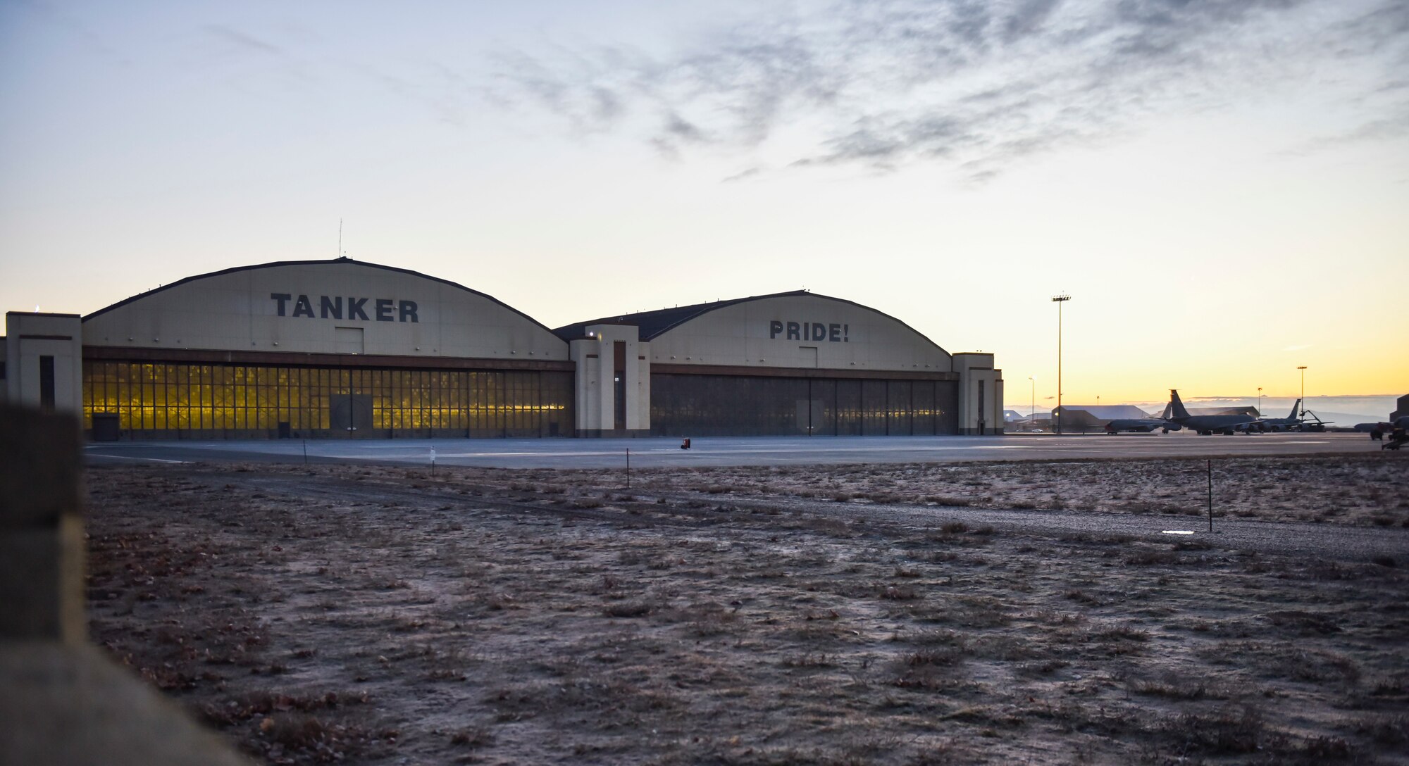The sun rises over the flight line at Fairchild Air Force Base, Washington, Feb. 27, 2020.
