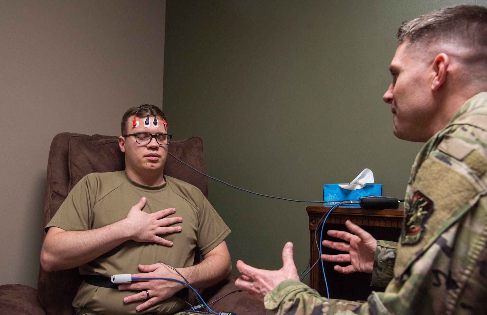 U.S. Air Force Major Jeffery Smith, 92nd Medical Operations Squadron mental health flight commander, talks a patient through breathing exercises February 27, 2020, at Fairchild Air Force Base, Washington.