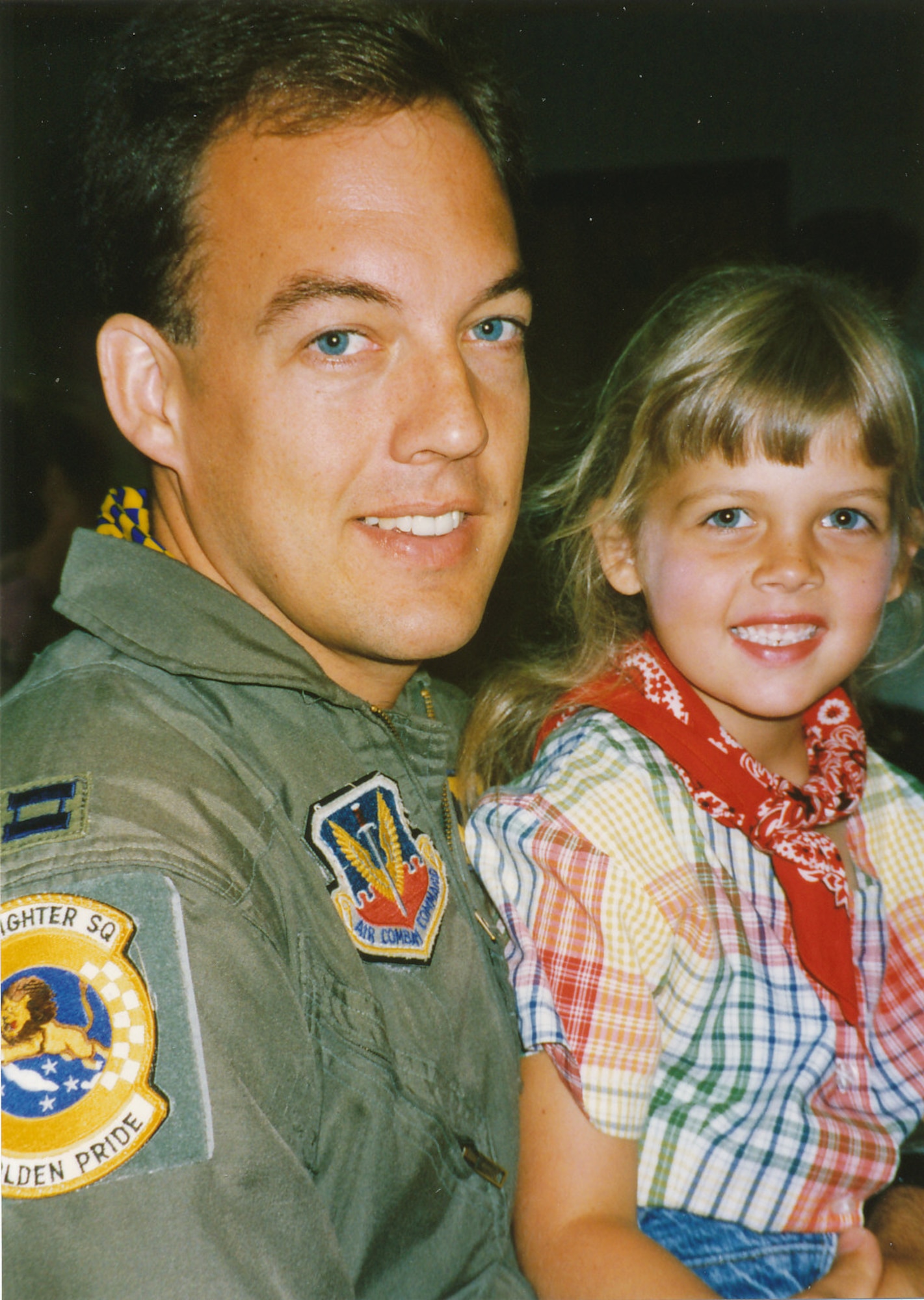 A photo of Kristin Wolfe and her father as an Air Force captain.