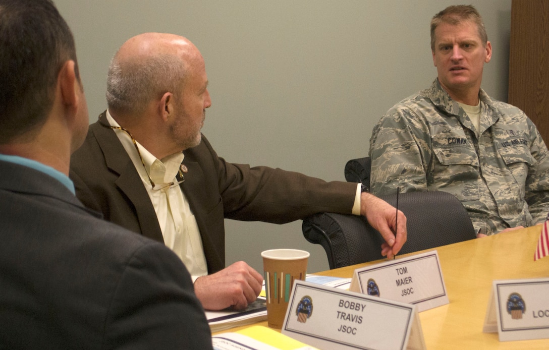 Air Force Lt. Col. Matt Cowan, a DLA Troop Support Medical pharmacist, speaks with Tom Maier, a Joint Special Operations Command logistics team lead, during a visit at DLA Troop Support Feb. 28, 2020 in Philadelphia.