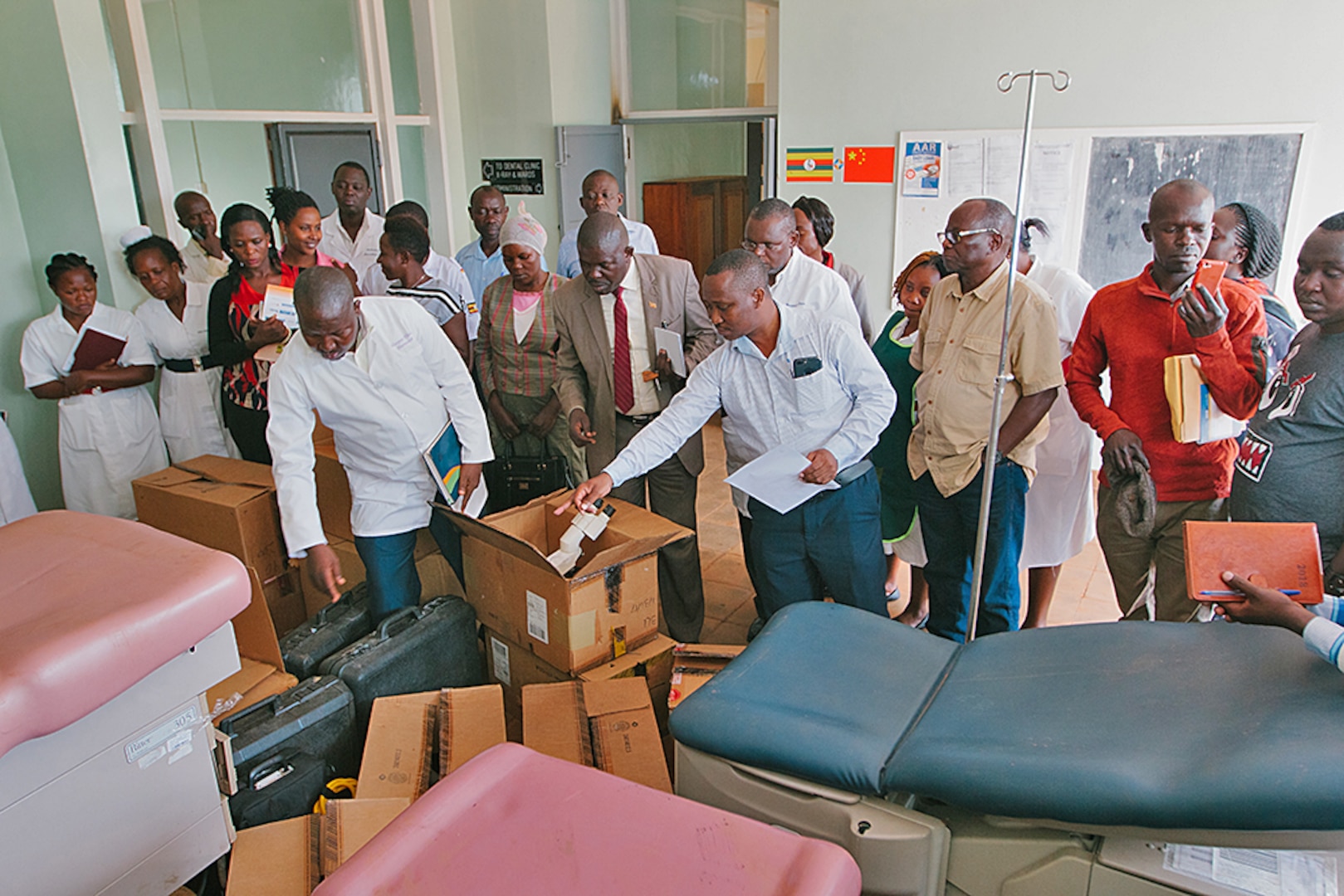 Doctors look at donated equipment