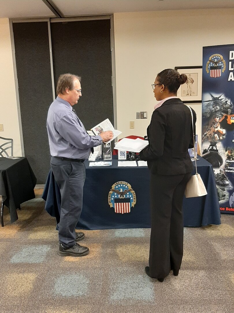 Jay Hilderbran speaks with OSU candidate about career opportunities at DLA.