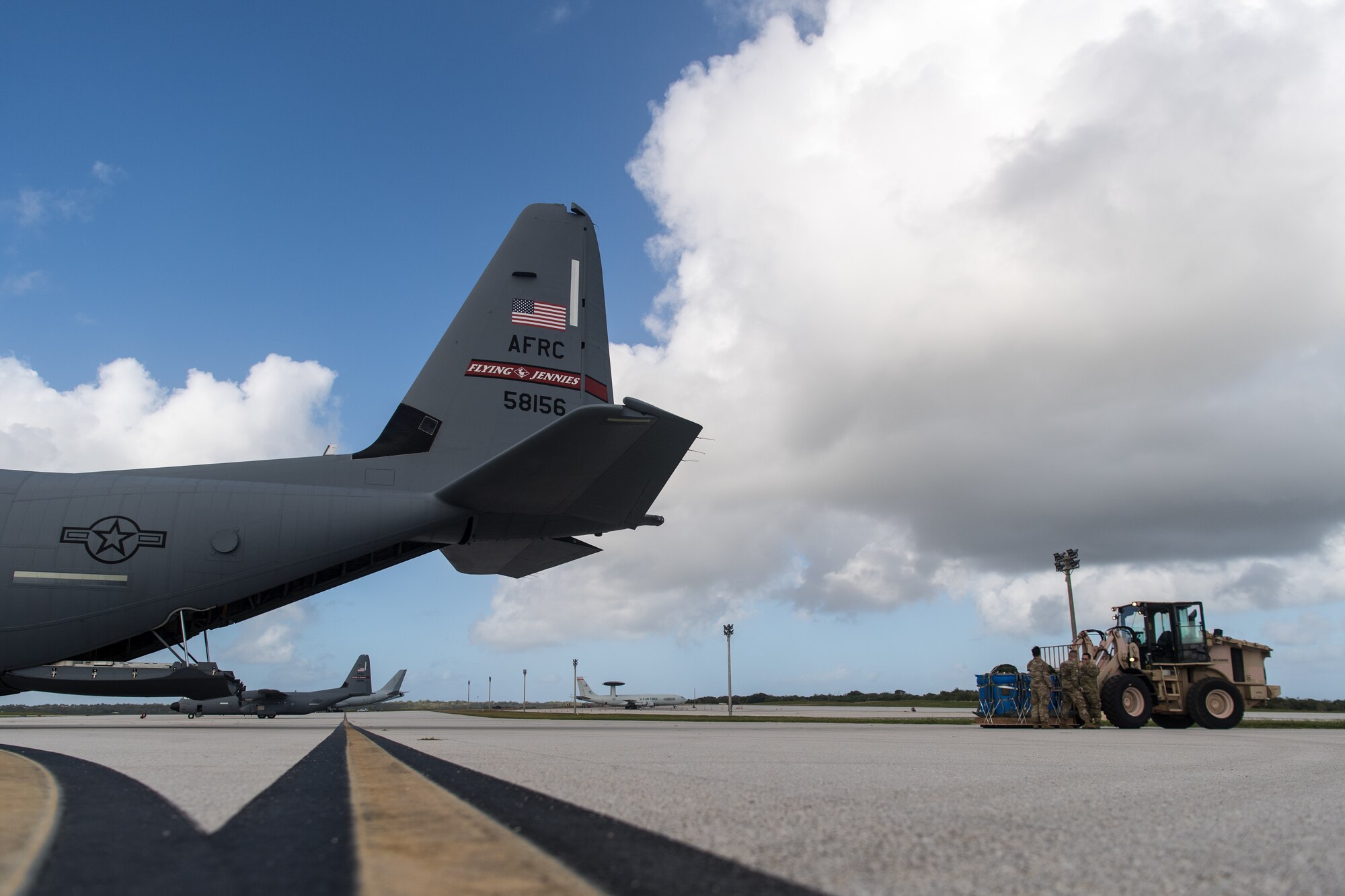 Airmen assigned to the 815th Airlift Squadron, Keesler Air Force Base, Mississippi, load container delivery systems onto a C-130J Hercules to be airdropped over Tinian during Exercise Cope North 20, Feb. 24, 2020, Andersen Air Force Base, Guam. Cope North 20 is an annual trilateral field training exercise conducted at Andersen Air Force Base, Guam, and around the Commonwealth of the Northern Mariana Islands (CNMI), Palau and Yap in the Federated States of Micronesia. (U.S. Air Force photo by Senior Airman Gracie Lee)